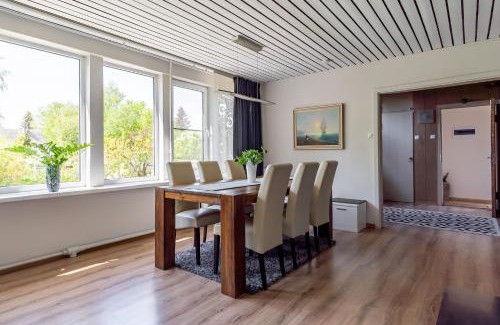 Parnu House | Inviting Villa with Garden and Oceanfront Views