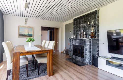 Parnu House | Inviting Villa with Garden and Oceanfront Views