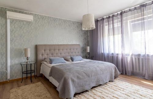 Parnu House | Inviting Villa with Garden and Oceanfront Views