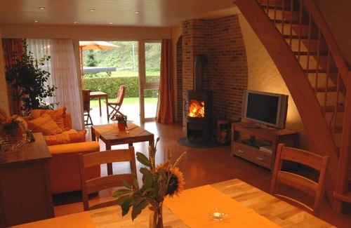 Wrexen House | Fantastic Holiday home with jacuzzi and fireplace at the border of a wood