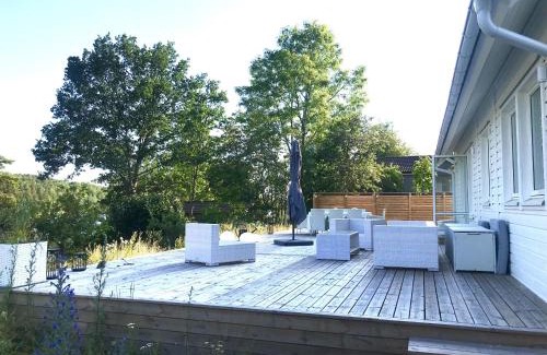 Flemingsberg House | Idyllic Retreat with Private Jetty and Stunning Lake Views