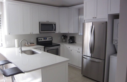 Palm Beach Gardens Condo | Idyllic PGA Club Cottage with Tranquil Pond Views