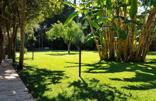 Partanna Villa | Idyllic Pool Oasis Amidst Expansive Private Gardens