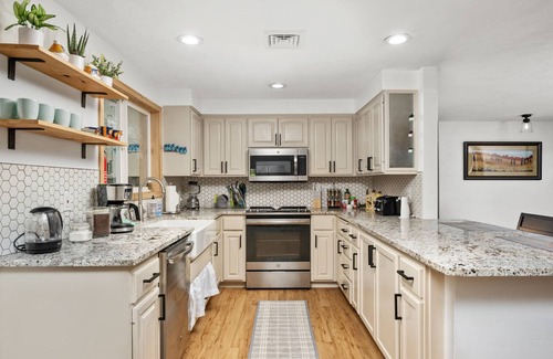 Coburg House | Prime Pet-Friendly Retreat with Hot Tub & Fenced Backyard