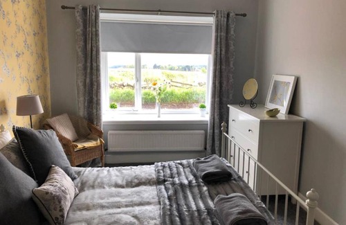 Duns Apartment | Cozy Farm Cottage with Real Coal Fire & Pet-Friendly Amenities