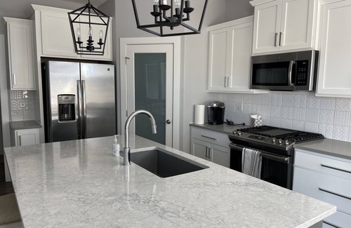 Johnston Villa | Charming Farmhouse Villa with Front Porch and Family-Friendly Amenities