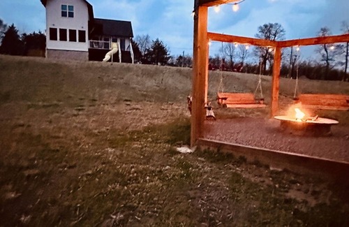 Glenwood House | Waterfront Farmhouse with Fire Pit, Pool & Family Fun