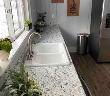 Johnson City House | Inviting Farmhouse with Game Room, Fire Pit & Creekside Fun