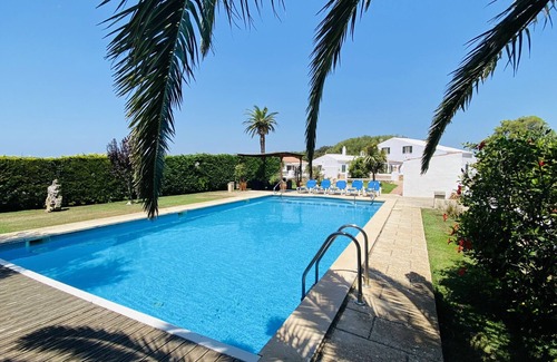 Alayor Villa | Relaxing Farmhouse Retreat with Pool and Padel Court