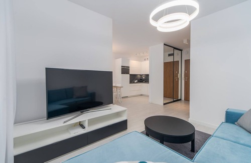 West Pomeranian Voivodeship Apartment | Faro Nadmorskie Tarasy SPA: Poolside Retreat by the Sea
