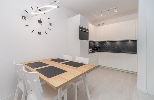 West Pomeranian Voivodeship Apartment | Faro Nadmorskie Tarasy SPA: Poolside Retreat by the Sea