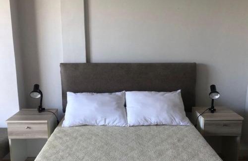 Las Colinas de Peralta Ramos Apartment | Faro Aparts: Family-Friendly Retreat with Pool & Breakfast