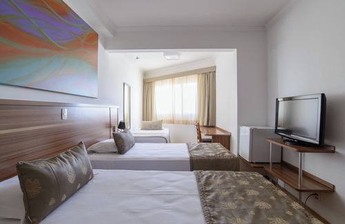 Sao Jose dos Campos Hotel | Discover Faro Hotel: Family-Friendly & Spa Amenities Await