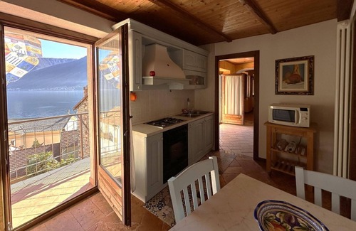 Colonno Apartment | Tranquil Faro sul Lago Apartment – Ideal for Families