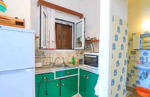 Gaios Apartment | Gaios Haven: Sea View Studio with Private Sun-Loungers