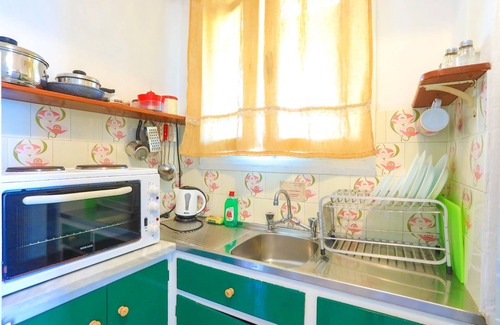 Gaios Apartment | Cozy Faros Exi: Beachfront Retreat with Ocean Views