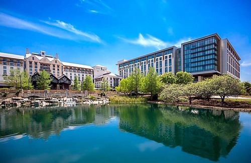 Grapevine Apartment | Featuring a 10-acre outdoor pool facility and a European-style spa .