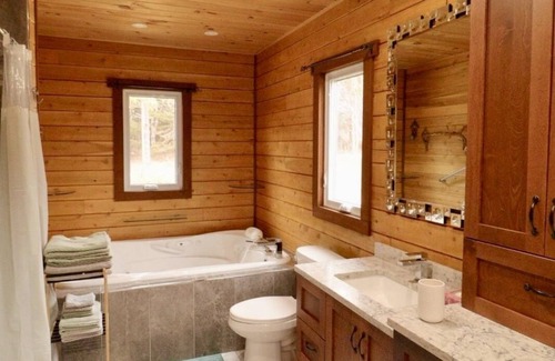 Harrington Villa | Scenic Lakeside Retreat with Spacious Green Areas