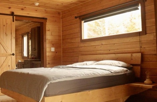 Harrington Villa | Scenic Lakeside Retreat with Spacious Green Areas
