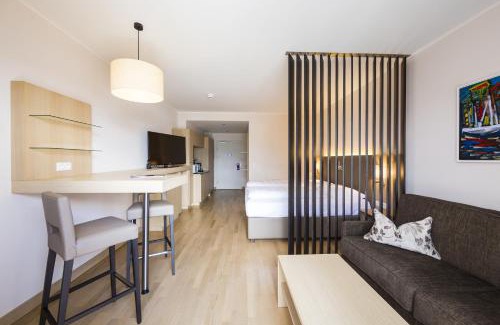 Krumpendorf am Woerther See Apartment | Relax at Feel Good Resort: Pet-Friendly Oasis with Spa