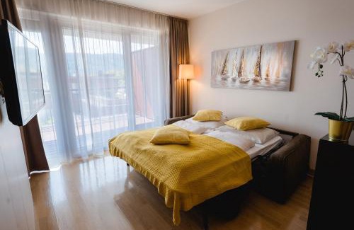 Krumpendorf am Woerther See Apartment | Relax at Feel Good Resort: Pet-Friendly Oasis with Spa