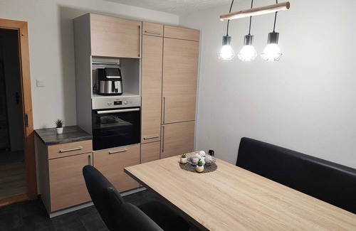 Kienberg Apartment | Feel-good vacation apartment with Swedish stove and cozy eat-in kitchen