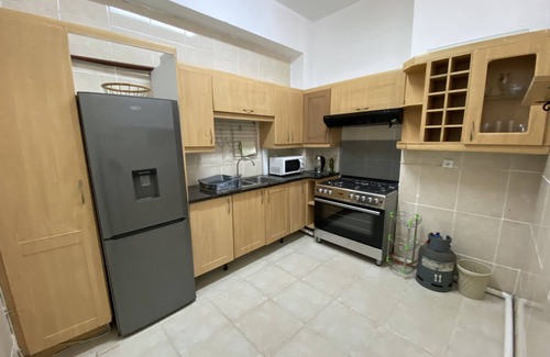 Polana Cimento A Apartment | Experience Comfort with Ocean View and Pool Access