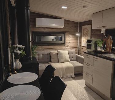 Lampivaara House | Fell Village 1 with a Mountain View, Fireplace, Sauna, Kitchen