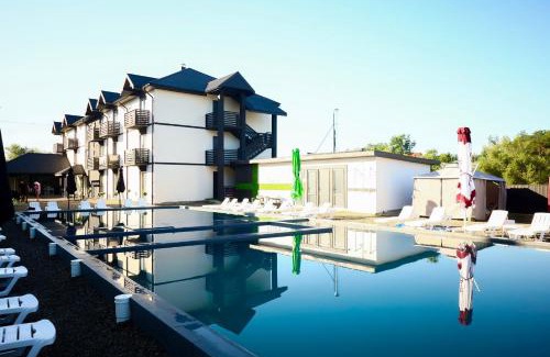 Solotvyno Hotel | Fenix Hotel: Oceanfront Stay with Pool & Family-Friendly Vibes