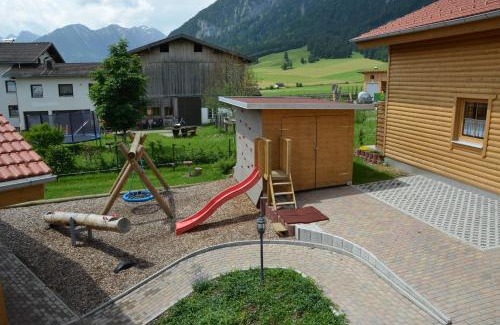 Hoefen Apartment | Relax at Feriendorf am Hahnenkamm - 4-Star Family Retreat