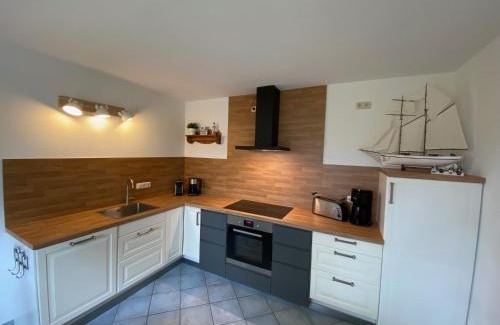 Pruchten House | Relaxing Ferienhaus Boddenblick with Sauna & Family-Friendly Amenities
