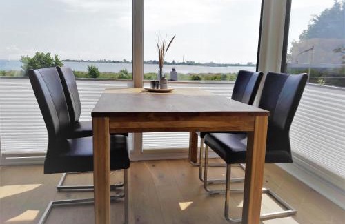 Fehmarn House | Discover Oceanview Retreat at Ferienhaus Brückenblick 12a