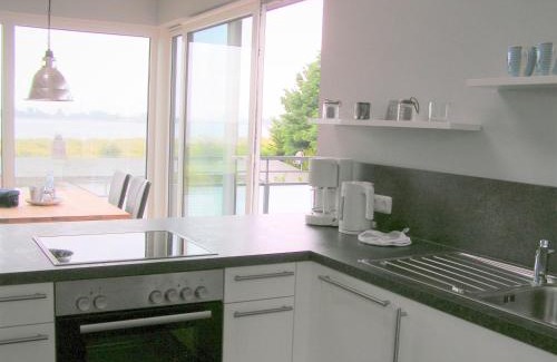 Fehmarn House | Discover Oceanview Retreat at Ferienhaus Brückenblick 12a