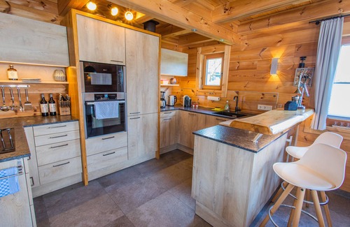 Aich House | Spacious Aich Retreat for 10 with Family-Friendly Perks