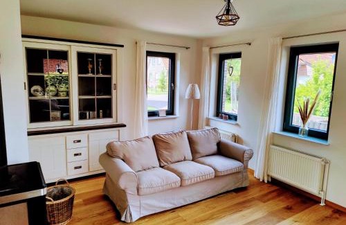 Ihlowerfehn House | Discover Ferienhaus Fehnglück: Family & Pet Friendly Retreat