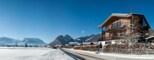 Koessen Apartment | Discover Ferienhaus Hetzenauer: 4-Star Pet-Friendly Retreat