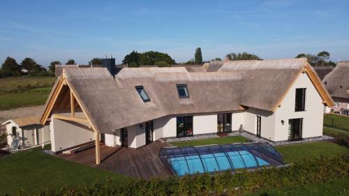 Puddemin House | Family-Friendly Retreat at Ferienhaus Inselglück