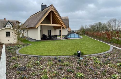 Puddemin House | Family-Friendly Retreat at Ferienhaus Inselglück