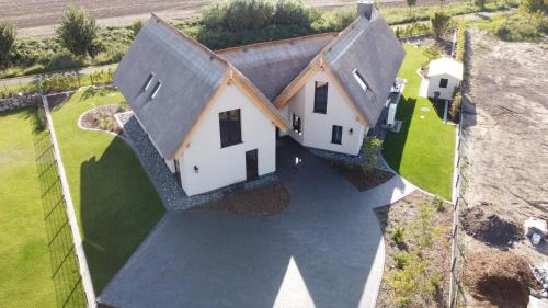 Puddemin House | Family-Friendly Retreat at Ferienhaus Inselglück