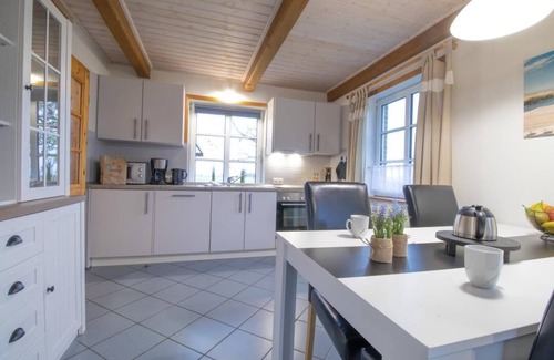Fahretoft House | Discover Ferienhaus Möwe: Pet-Friendly Retreat with Sauna