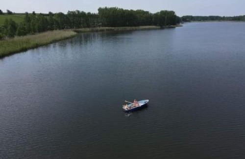 Riepke Apartment | Idyllic Retreat at Mecklenburgische Seenplatte with Boat