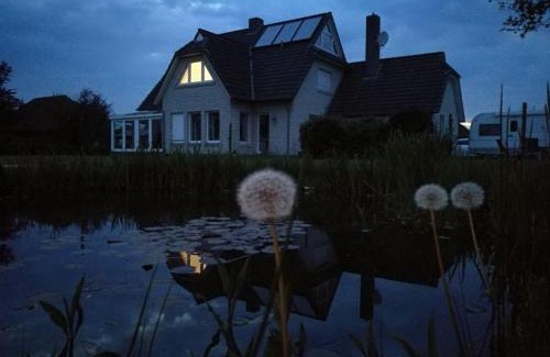 Moorhusen House | Oceanfront Retreat at Ferienhaus Ossi - Rated 9/10!