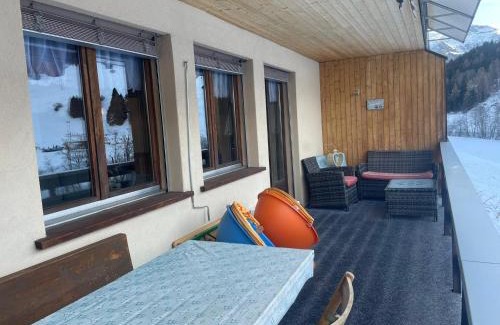 Savognin Apartment | Family-Friendly Retreat at Ferienhaus Somareiva, Rated 8.5