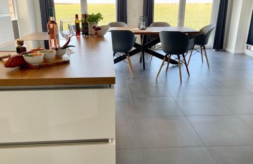 Fehmarn House | Oceanfront Retreat: Ferienhaus Sundowner FH6, Rated 9.7/10