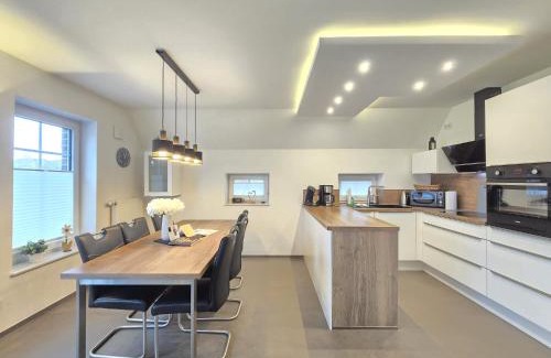 Neßmersiel House | Discover Family-Friendly Ferienhaus Urlaubsglück - 4 Stars!
