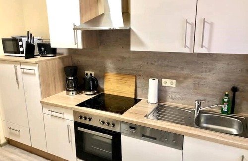 Obstfelderschmiede Apartment | Cozy Ferienwohnung 2 Alte Schule with Breakfast & Kid-Friendly