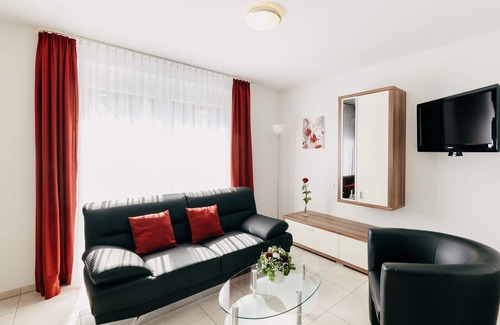 Bad Urach Apartment | Cozy Ferienwohnung 5 with Kitchen & Breakfast Included