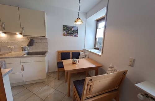 Rottau Apartment | Almglück Retreat: Cozy Bedroom, Kitchen & Terrace Awaits