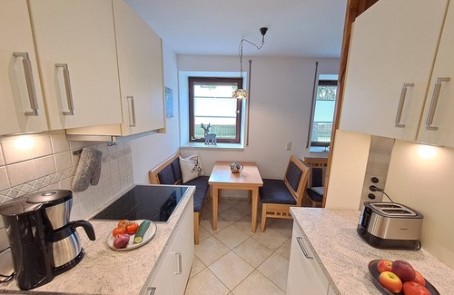Rottau Apartment | Almglück Retreat: Cozy Bedroom, Kitchen & Terrace Awaits