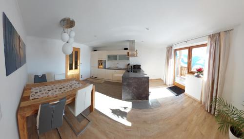 Kitzbuehel Apartment | Experience Oceanfront Bliss at Ferienwohnung Brixental